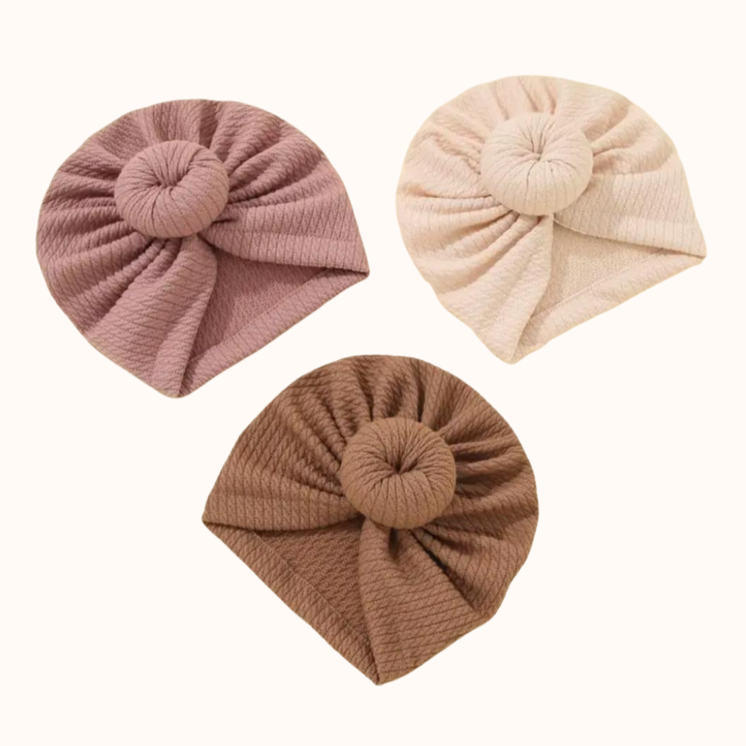 Baby tulband/hoofdband/mutsje, maat 0 - 6 maanden. In de kleuren bruin, beige en roze.